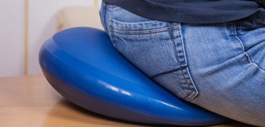 Sitzkissen Haltung Rückenschmerzen Büroarbeit